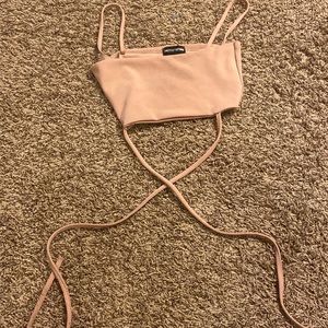 Pinkish tan crop top with strings